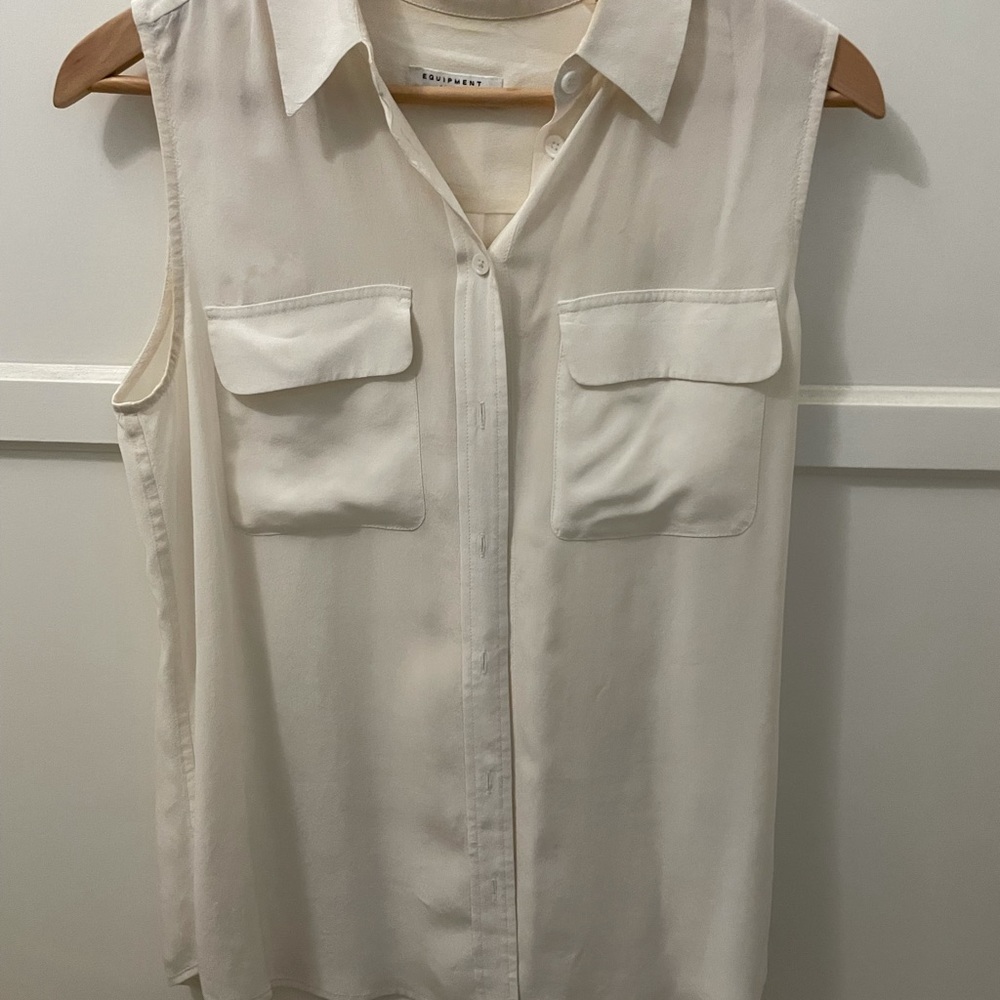 White equipment button up sleeveless blouse.